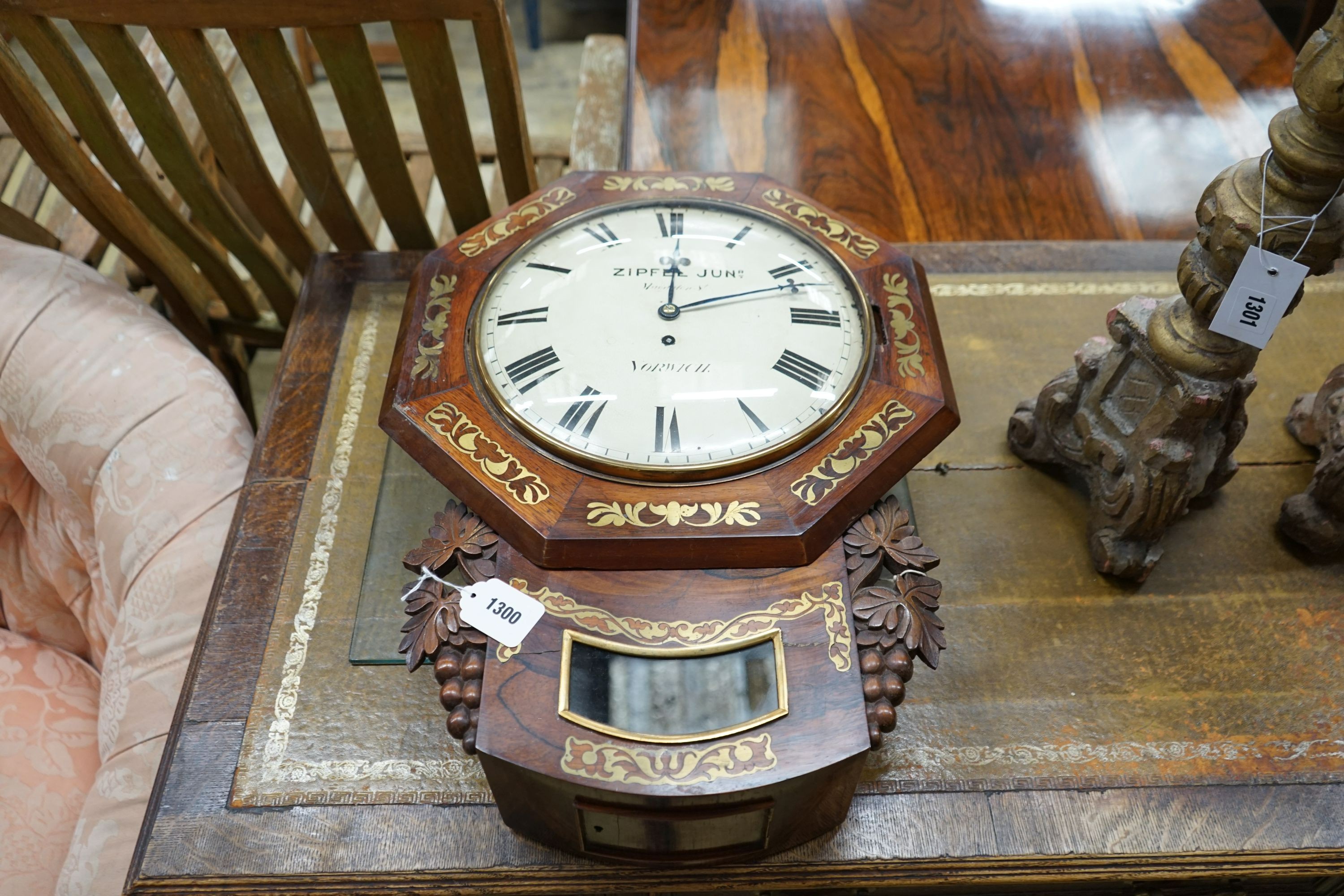 A Regency rosewood brass inlaid drop dial wall clock, width 44cm, height 60cm